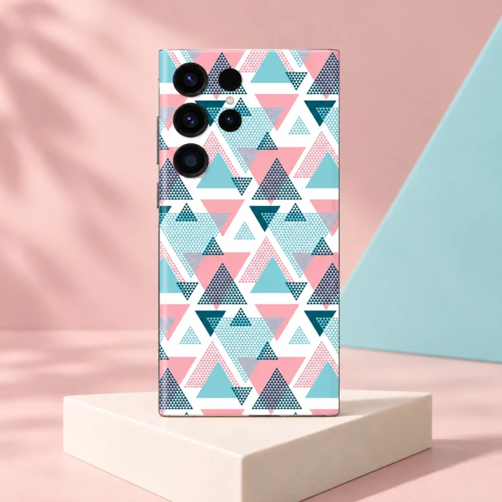 Pink, turquoise and deep teal abstract triangle pattern mobile skin on a white background, blush studio hero