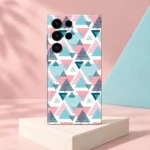 Pink, turquoise and deep teal abstract triangle pattern mobile skin on a white background, blush studio hero