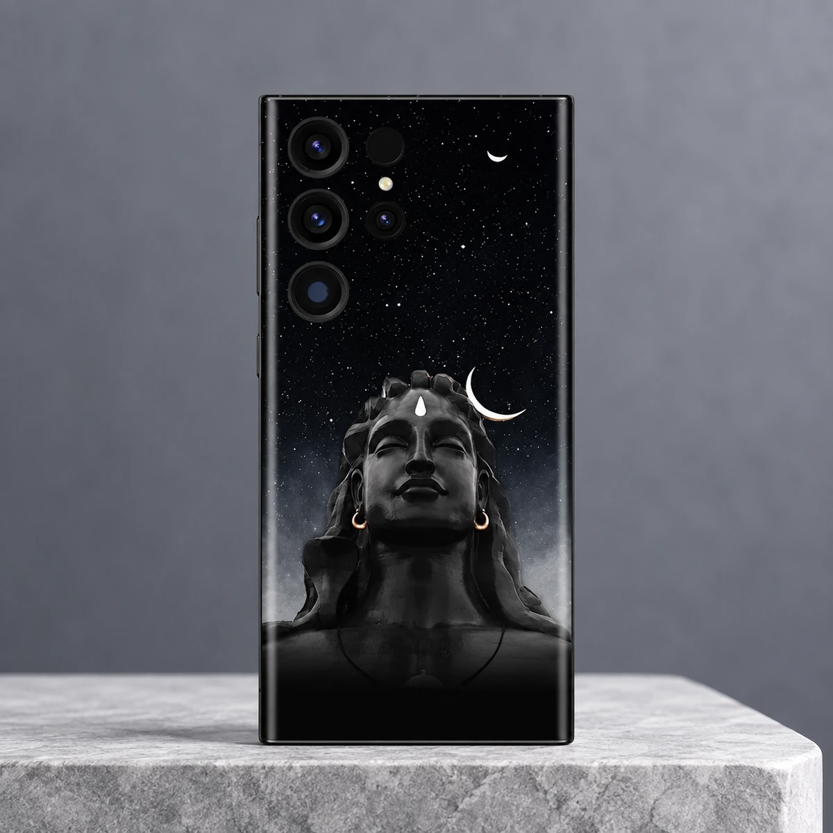 Adiyogi Starry Night Mobile Skin - hero Adiyogi portrait mobile skin with black starry sky and white crescent moons on a cool grey pedestal