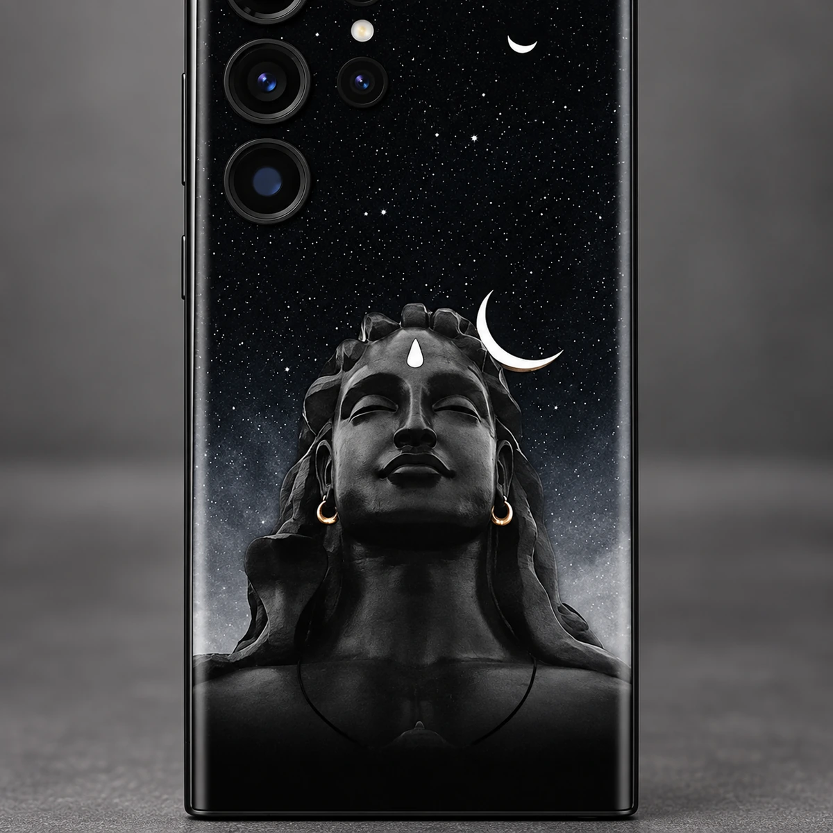 Adiyogi Starry Night Mobile Skin - portrait detail Close view of Adiyogi statue portrait with white crescent and gold earrings on a black starry mobile skin