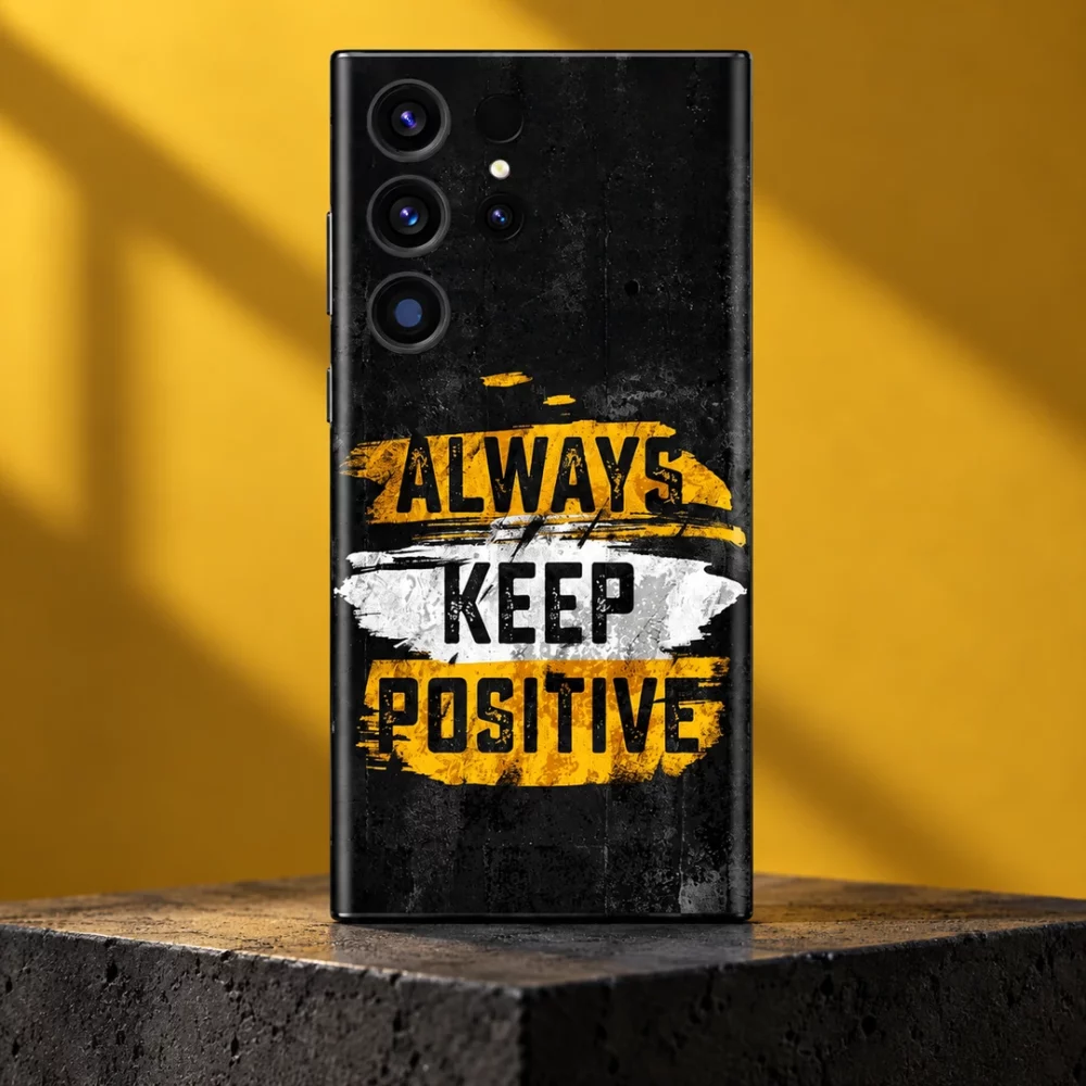 Always Keep Positive quote mobile skin in black, yellow and white, mustard studio hero view
