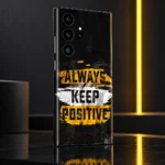 Always Keep Positive quote mobile skin in black, yellow and white, yellow reflective studio view