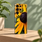 Black Eyed Susan mobile skin with golden yellow petals and dark flower center, sage studio angle