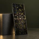 Olive camouflage mobile skin with a gold eagle and eight stars, studio angle