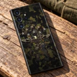 Olive camouflage mobile skin with a gold eagle and eight stars, eagle artwork detail
