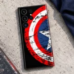 Captain America distressed red white and blue shield mobile skin, concrete flat lay