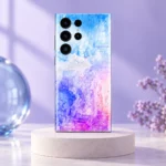 Colorful Art mobile skin with blue pink and lavender abstract artwork on an ivory plinth