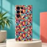 Colorful Pattern mobile skin with tiny multicolour geometric tiles on a cream plinth