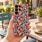 Colorful Pattern mobile skin held in a sunlit cafe setting