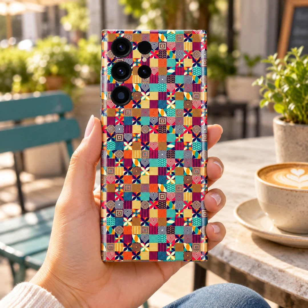 Colorful Pattern Mobile Skin - Cafe Handheld Colorful Pattern mobile skin held in a sunlit cafe setting