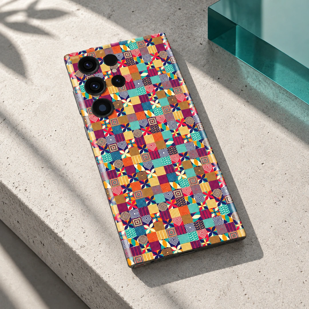 Colorful Pattern Mobile Skin - Concrete Detail View Colorful Pattern phone skin on pale concrete with a teal acrylic accent