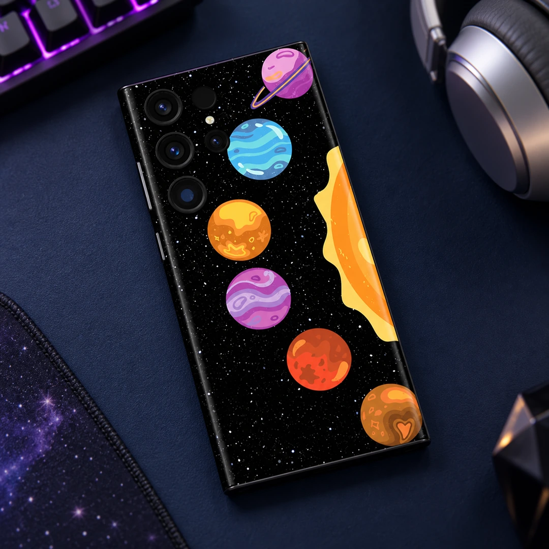 Colourful Planets Mobile Skin - Gaming Flat Lay Colourful Planets Mobile Skin lying on a navy gaming desk