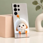 Cute white bunny mobile skin with orange accents, sage studio display