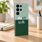 Don't quit quote mobile skin in sage and forest green with do it letters highlighted, oak desk angle