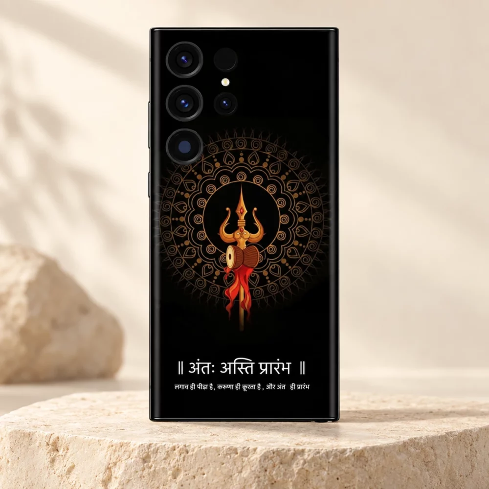 End Is The Beginning Trishul Damru mobile skin in black and gold on an ivory stone pedestal