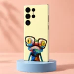 Pale yellow Frog With Glasses Mobile Skin with colorful frog artwork, pastel studio angle