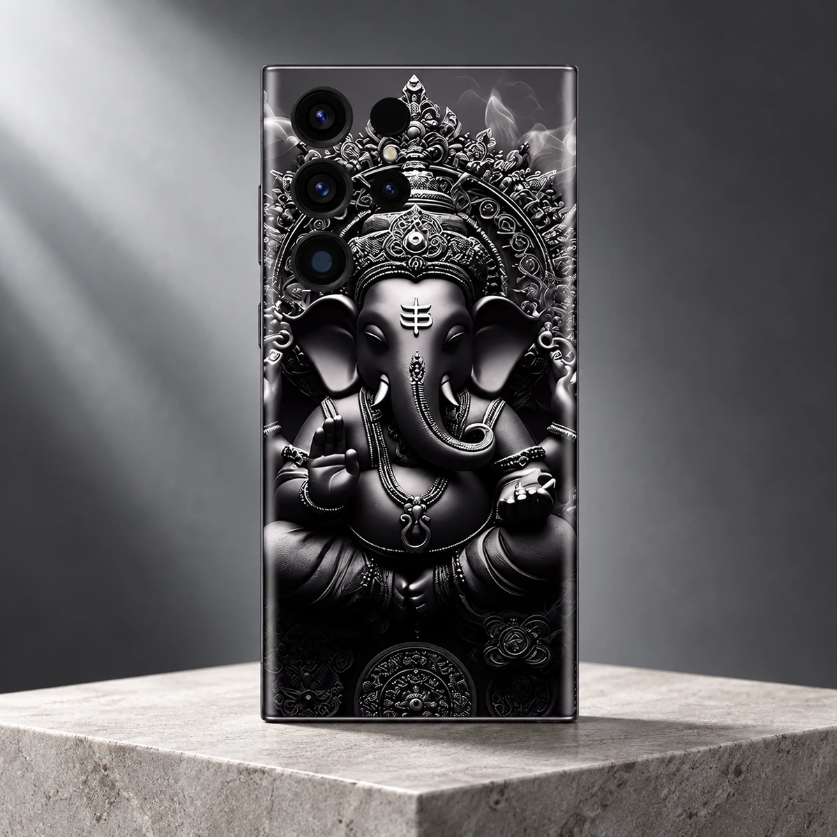 Ganesh Statue Mobile Skin - silver hero Ganesh Statue Black and Silver Mobile Skin displayed upright on a pale stone pedestal