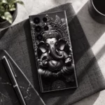 Ganesh Statue Mobile Skin on charcoal linen in a monochrome overhead flat lay
