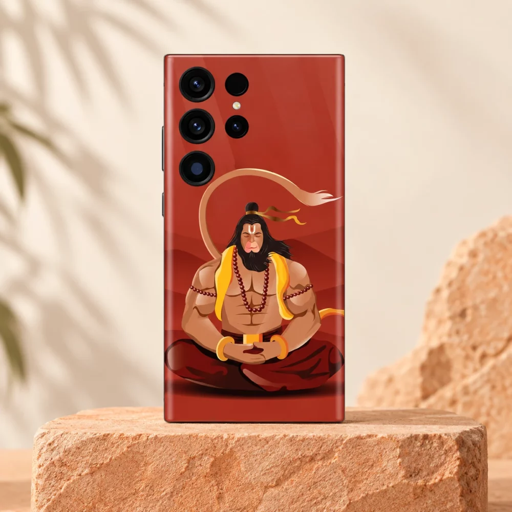 God Hanuman mobile skin with a meditating Hanuman illustration on terracotta red on a sandstone pedestal