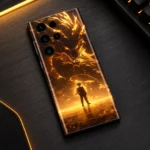 Golden Dragon Anime Mobile Skin shown back-up diagonally on an amber-lit gaming desk