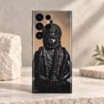 Close detail of Hanuman statue face ornate crown and layered bead garlands printed on phone skin