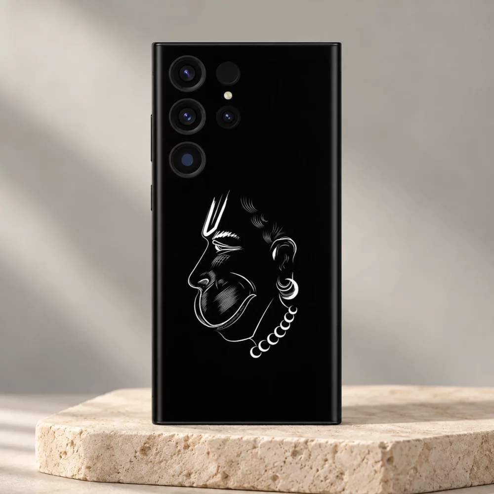 Hanumanji face white line art mobile skin on black displayed on an ivory pedestal