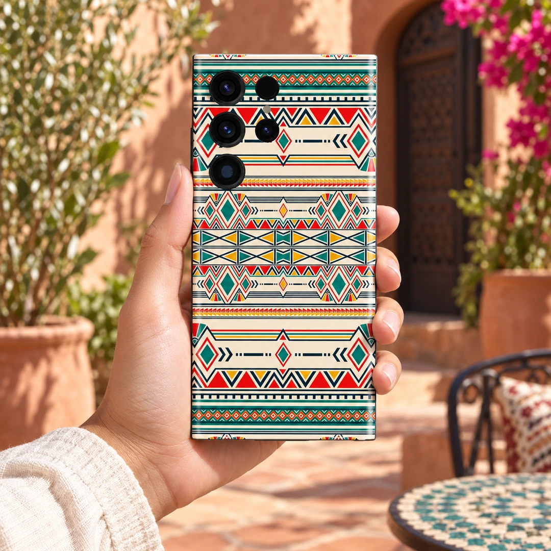 Ikat Geometric Pattern Mobile Skin - in hand in a sunlit courtyard Ikat Geometric Pattern Mobile Skin shown in hand in a sunlit courtyard