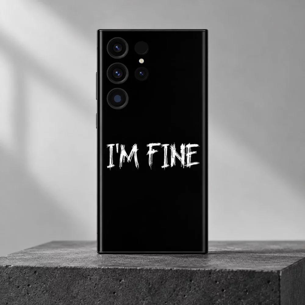 Black I'm Fine mobile skin with white distressed lettering, charcoal studio hero