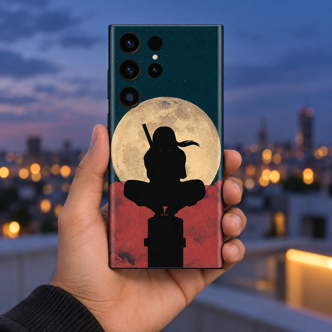 Itachi Moon Mobile Skin - Blue Hour Handheld Itachi Moon mobile skin with black ninja silhouette and cream moon, blue hour handheld view