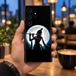 Jay Shree Krishna full moon mobile skin held in a cafe at blue hour