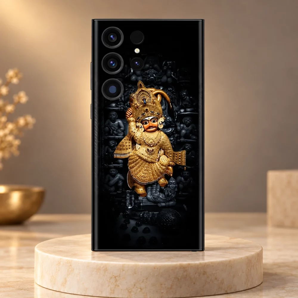 Kashtabhanjan Dev Golden Hanuman Mobile Skin displayed on an ivory stone pedestal