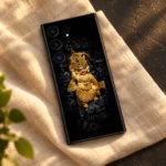 Kashtabhanjan Dev Hanuman mobile skin on cream linen in a warm flat lay