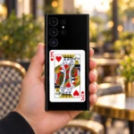 Black King of Hearts card mobile skin with red K symbols, cafe handheld view