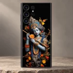 Close view of Krishna portrait golden flute jewellery and flowers on black mobile skin
