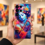 Krishna mobile skin with colourful blue portrait and golden orange flute, gallery in-hand