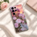 Light pink roses mobile skin with sunset sky and white picket fence - linen flat lay