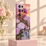 Light pink roses mobile skin with sunset sky and white picket fence - ceramic studio angle