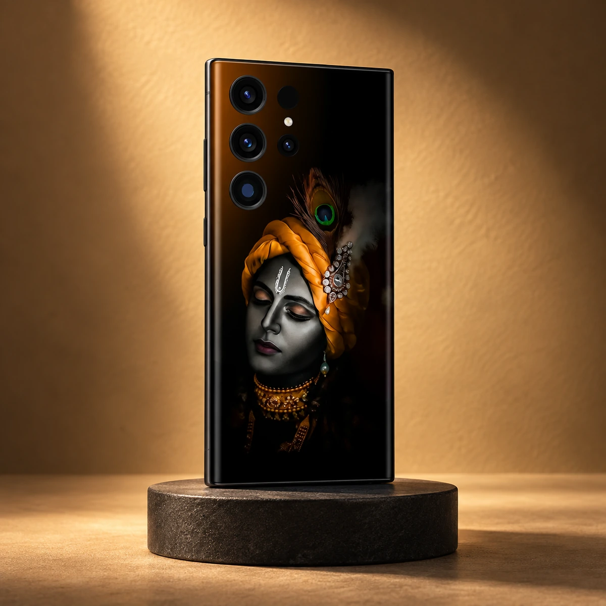 Lord Krishna Saffron Turban Mobile Skin - amber studio Black Lord Krishna portrait mobile skin with saffron turban on a charcoal pedestal in amber studio light
