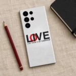White typography mobile skin with black and red LOVE lettering and Like There's No Tomorrow quote, linen flat lay