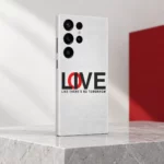 White typography mobile skin with black and red LOVE lettering and Like There's No Tomorrow quote, stone gallery angle