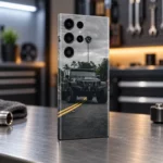 Black off-road SUV mobile skin with palm trees, a cloudy sky and yellow road lines, garage studio angle