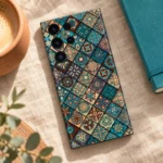 Teal and earthy diamond mosaic mandala mobile skin, linen desk flat lay