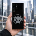 Black Marvel Shield mobile skin with grey circular eagle emblem, city lifestyle