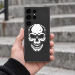 Minimal White Skull Mobile Skin with white skull artwork on charcoal grey, urban handheld view