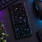 Black motif pattern mobile skin with purple and blue line art doodles, tech desk view