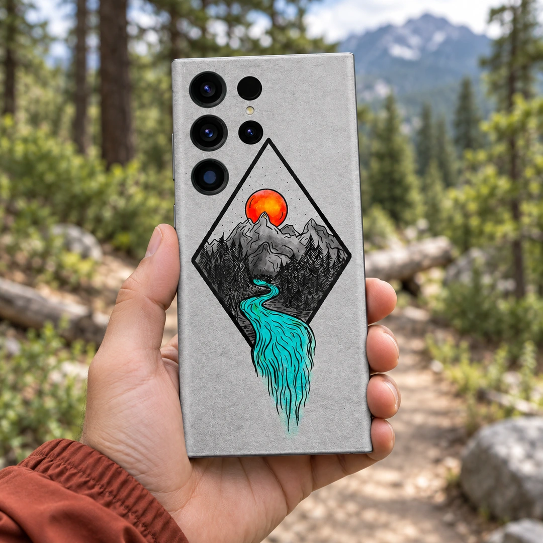 Mountain Art Mobile Skin - Handheld Forest Trail View Mountain Art Mobile Skin with orange sun and turquoise river, handheld forest trail view