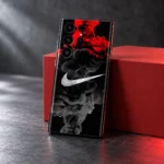 Black phone skin with white swoosh and red and grey smoke, red block studio view