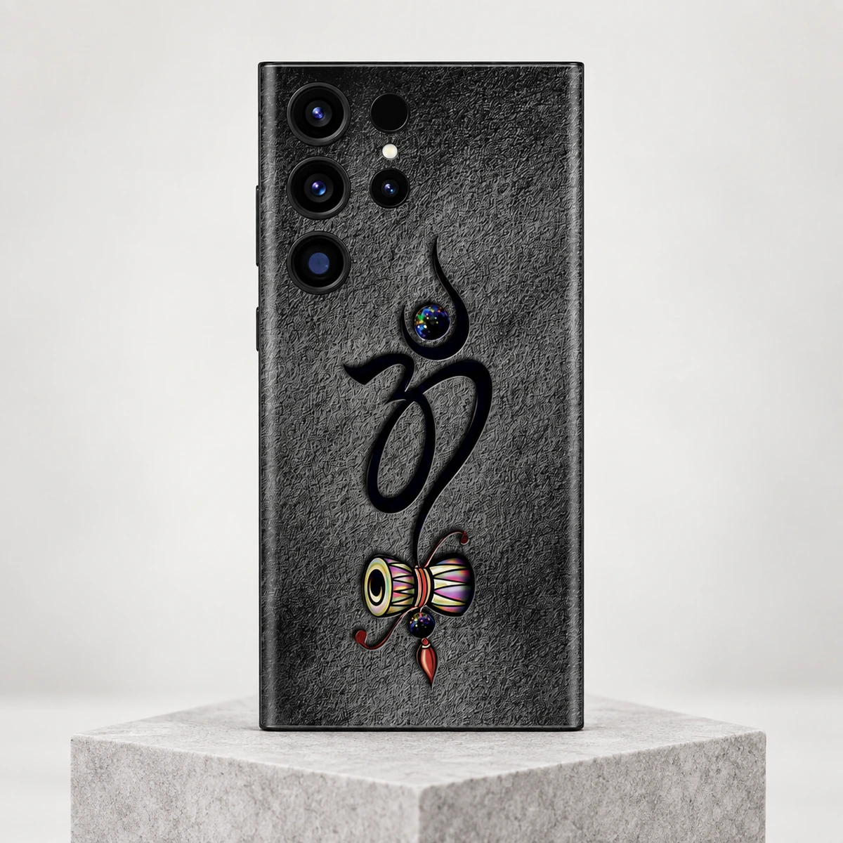 Om Damru Charcoal Mobile Skin - Grey stone hero Om With Damru mobile skin with black Om and colourful damru on charcoal - grey stone hero