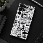 Black and white One Piece wanted poster mobile skin with Luffy and Shanks, desk flatlay