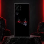 Red Anime Eyes Black Mobile Skin shown upright on black stone with subtle red studio lighting